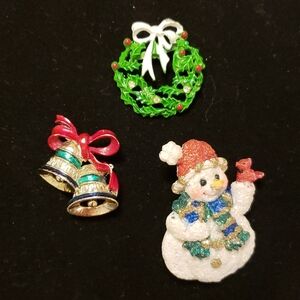 Three vintage holiday pins
